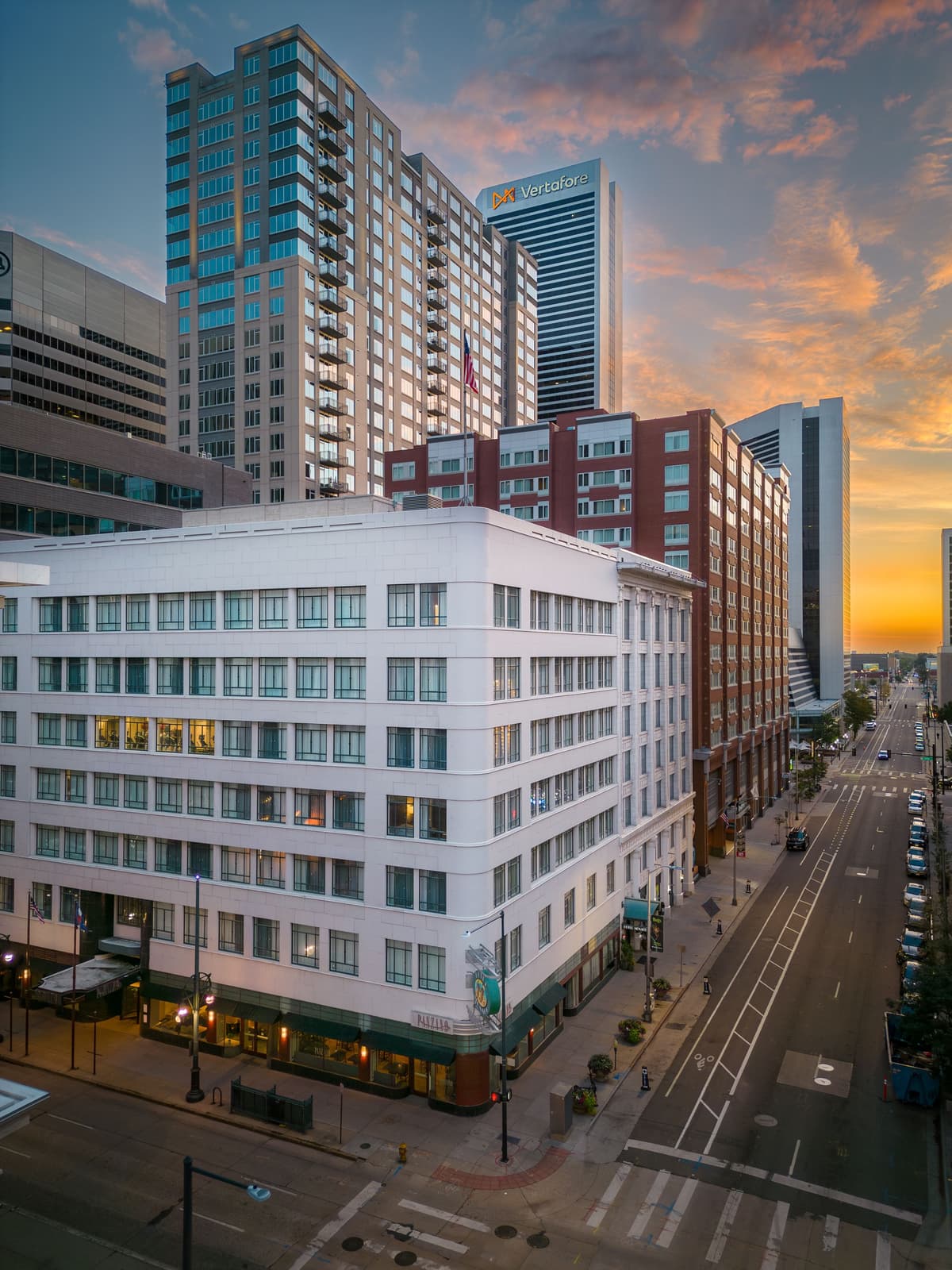 Aerial view of the Kimpton Monaco Hotel in downtown Denver at sunrise.