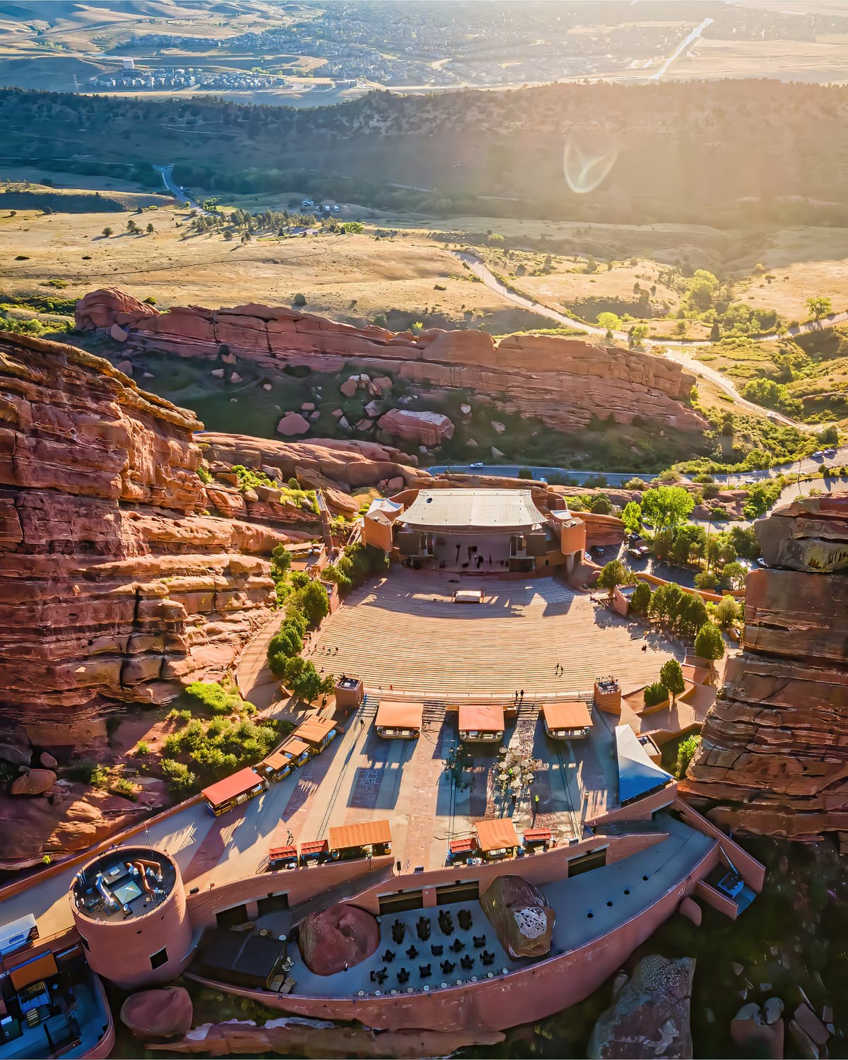 Aerial view of Red Rocks Amphitheater at sunrise, shot for Visit Denver.