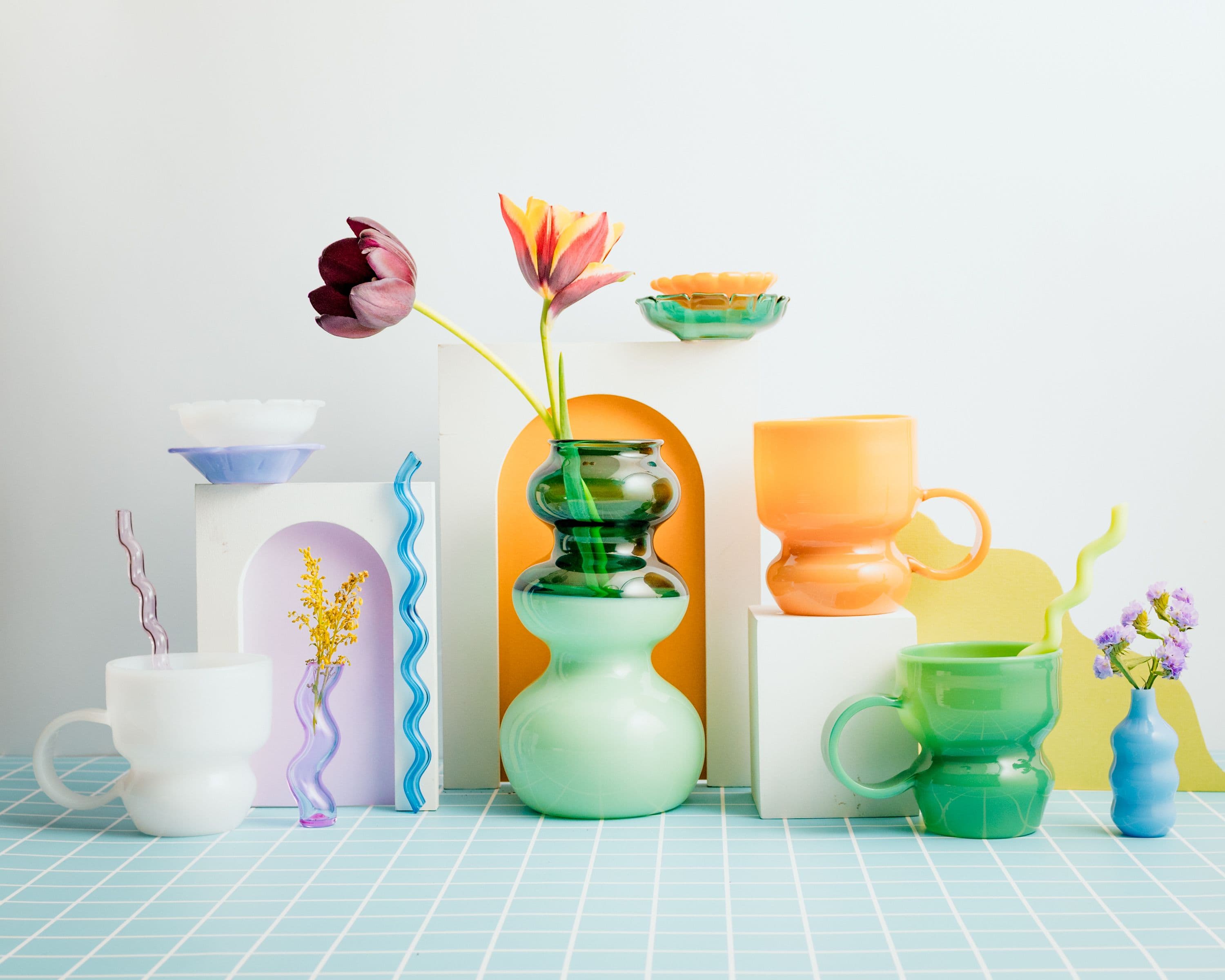 Group Image featuring Blown Glass Vases, Mugs, and Straws by Coldberger Glass 